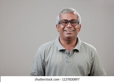 Portrait Of A Middle Aged Man Of Indian Origin