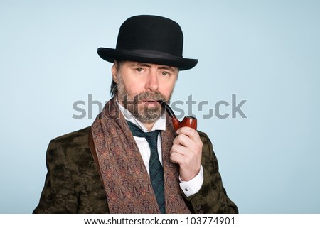 Portrait of middle aged man with a pipe.