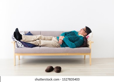 Portrait of middle man in front of white wall - Powered by Shutterstock