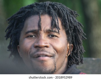 Portrait Of A Middle-aged African Man With A Traditional Hairstyle. Representative Of The Negroid Race, Originally From Cameroon.