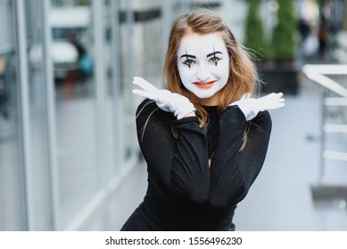 Portrait Of A Mime Comedian. Mime Girl On The Street