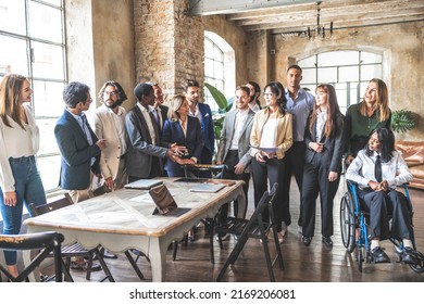 Portrait of mixed age corporate working team with multiracial and disabled  - Shutterstock ID 2169206081