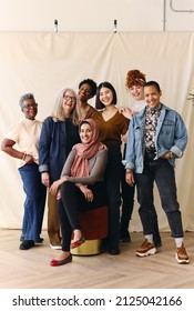 Portrait Of Mixed Age Range Multi Ethnic Women Smiling In Celebration Of International Women's Day