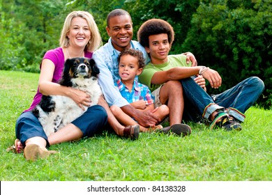 Portrait Of Mixed Race Family At Park