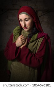 Portrait Of A Model In Biblical Clothing During A Bible Scene Acting As Mary Magdalene Or The Virgin Mary