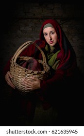 Portrait Of A Model In Biblical Clothing During A Bible Scene Acting As Mary Magdalene Or The Virgin Mary