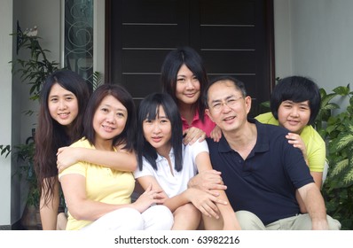 Portrait Of Modern Asian Family