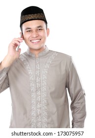 Portrait Of Modern Muslim Man Calling By Mobile Phone Isolated Over White Background