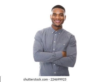 Portrait of a modern young black man smiling with arms crossed on isolated white background