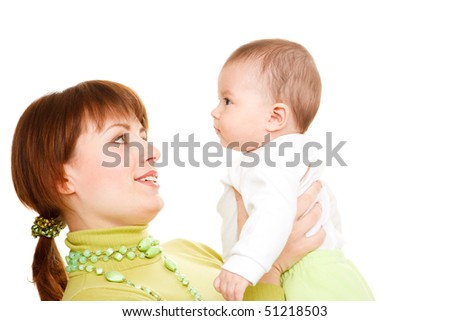 Portrait of mom holding baby in hands
