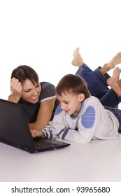 Portrait Of A Mom With Son At Laptop