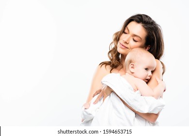 Portrait Of Mother With Closed Eyes Holding Baby, Isolated On White