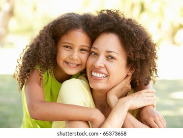 Portrait Of Mother And Daughter In Park