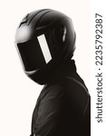 Portrait of a motorcycle rider posing with a black helmet on a white background.