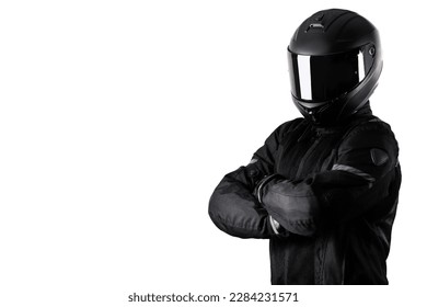 Portrait of a motorcylce rider on a white background arms crossed.