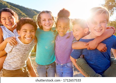 Portrait Of Multi-Cultural Children Hanging Out With Friends In Countryside Together - Shutterstock ID 1712657533