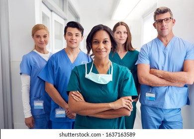 Portrait Of Multi-Cultural Medical Team Standing In Hospital Corridor - Shutterstock ID 1637163589