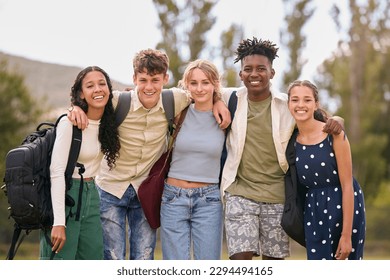 Portrait Of Multi-Cultural Secondary Or High School Students Hugging Outdoors