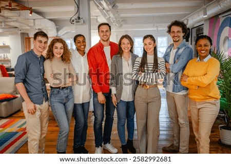 portrait of multicultural work team pose and smile in the office