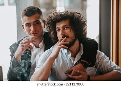 Portrait Of Multiethnic Diverse Gay LGBT Romantic Male Couple Embracing And Showing Their Love