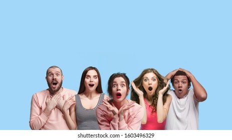 Portrait of multiethnic group of young people isolated on blue studio background, flyer, collage. Concept of human emotions, facial expression, sales, advertising. Shocked, astonished, wondered crazy. - Shutterstock ID 1603496329
