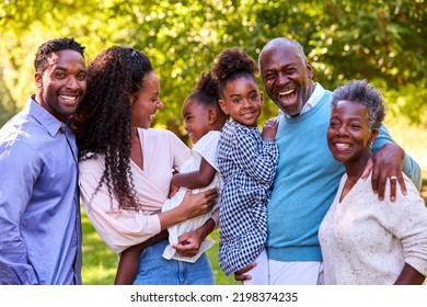 Portrait Of Multi-Generation Family Enjoying Walk In Countryside Together - Powered by Shutterstock