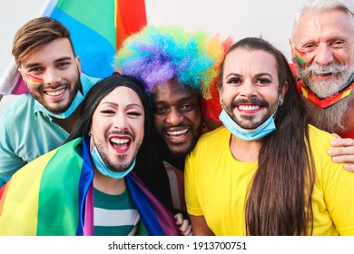 Portrait Of Multiracial Gay People Having Fun At Lgbt Pride Parade - Main Focus On Drag Quueens Faces