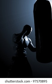 Portrait Of A Muscular Male Kick Boxing - Lowkey Shot, Selective Focus