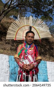 Portrait of a Naga tribesman dressed in traditional attire at Kohima Nagaland India on 4 December 2016
