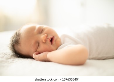 Portrait of new born adorable baby girl sleeping 