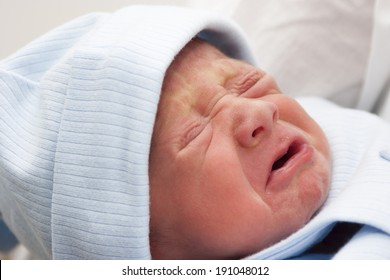 Portrait Of New Born Baby Crying