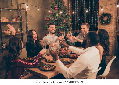 Portrait of nice attractive gorgeous lovely smart stylish cheerful cheery ecstatic overjoyed glad positive guys having fun congratulating fairy night midnight in decorated house room - Powered by Shutterstock