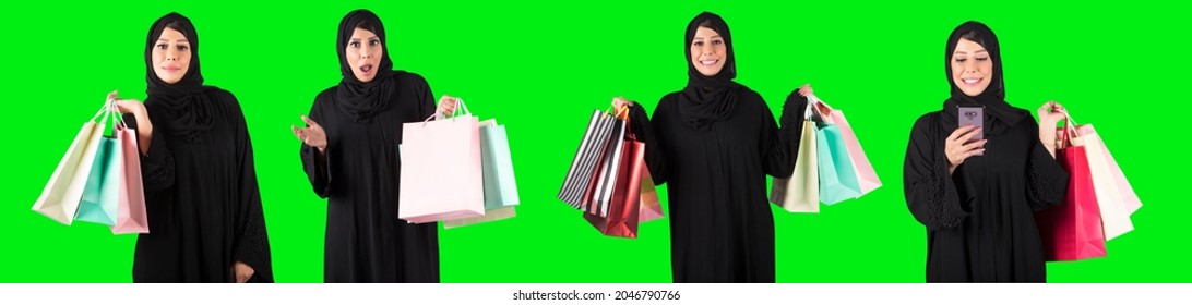 portrait of nice attractive pretty glad cheerful Arab girl carrying shopping bags isolated on bright vivid shine vibrant green color background