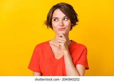 Portrait of nice brunette optimistic lady look empty space wear red t-shirt isolated on vivid yellow color background - Shutterstock ID 2045843252