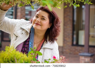 Portrait Nice European Middle Age Simple Plus Size Woman Walk At The City Center At Warm Autumn Day And Enjoy The Life, Have Cozy Mood