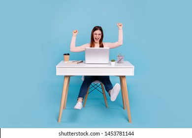 Portrait of nice lovely attractive cheerful cheery glad girl grant winner win good job done breakthrough at work place station isolated over bright vivid shine blue green background - Shutterstock ID 1453781144
