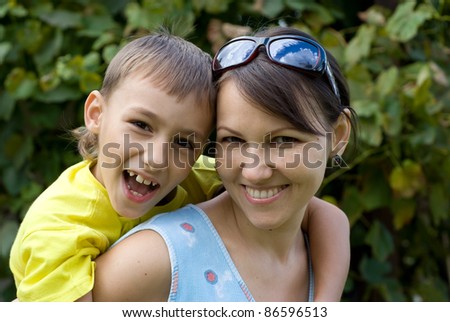 portrait of a nice parent with kid