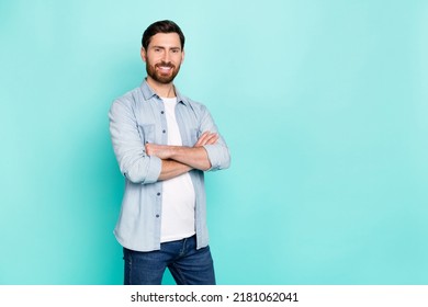 Portrait Of Nice Positive Person Folded Arms Toothy Smile Empty Space Blank Isolated On Teal Color Background