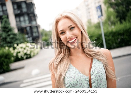 Portrait of nice sweet cheery gorgeous cute girl city street blurred backdrop pastime weekend summertime springtime outside