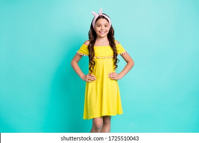 Portrait of nice sweet kid girl enjoy spring free time walk put hands waist wear good look outfit skirt isolated over teal color background