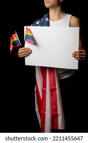 A Portrait Of A Nineteen Year Old Teen Boy On A Black Background With An American Flag And White Board And Pride Flags