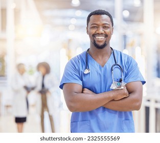 Portrait, nurse and black man with arms crossed, smile and healthcare in hospital. Medical professional, face and confident surgeon, African doctor or worker with pride for career, job and wellness - Powered by Shutterstock