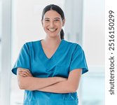 Portrait, nurse and happy woman with arms crossed for healthcare career, pride and service in hospital. Face, smile and confident medical professional, employee and expert surgeon working in Spain