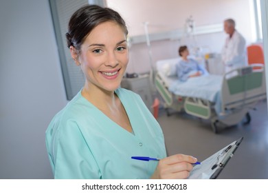 Portrait Of Nurse Outside Of Hospital Room