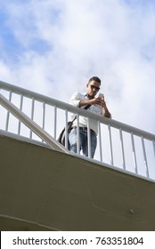 Portrait of an office worker using a mobile phone ( Lifestyle )