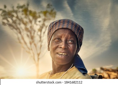 portrait of an old African woman at sunset in her village in Botswana