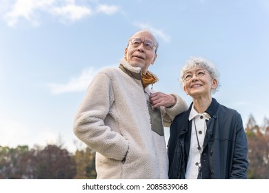 Portrait of old aged Asian couple.