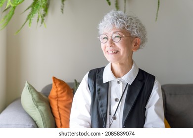 Portrait Of Old Aged Asian Woman.