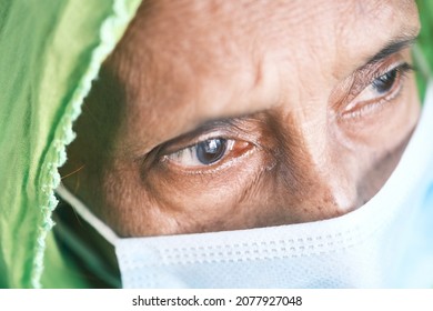 Portrait Of An Old Indian Woman Wearing A Surgical Mask