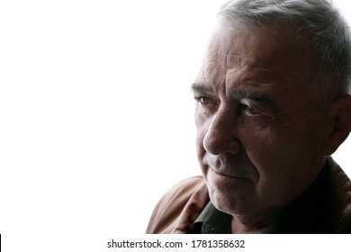 Portrait Of Old Man On White Background. Aged Male In Profile. Free Space For Text.